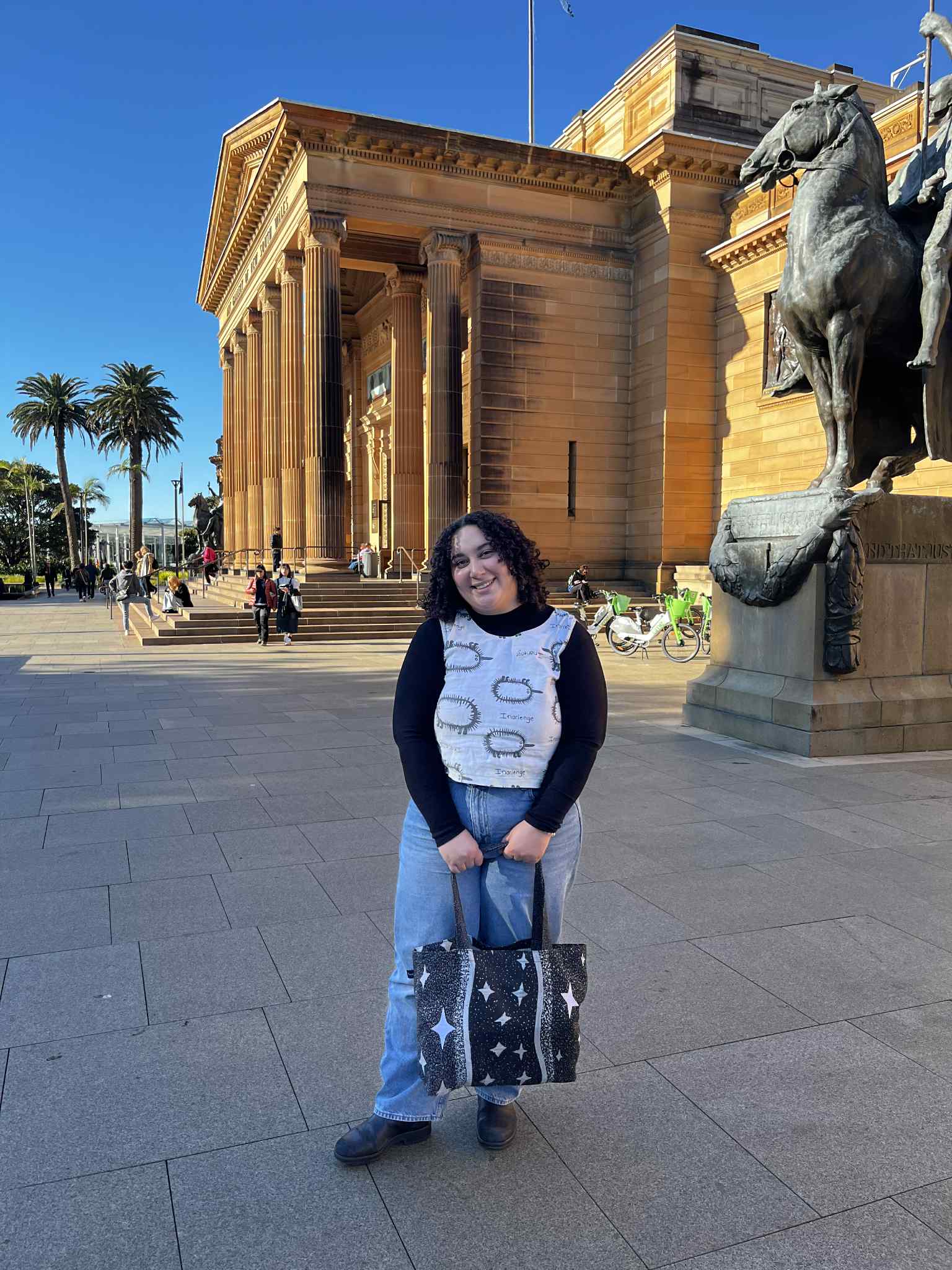 Person standing in front of the Art Gallery of NSW
