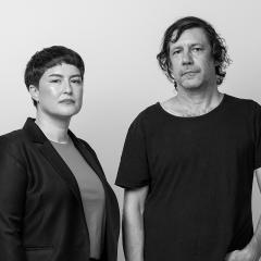 Image: Portrait of curator Ellie Buttrose (left) and artist Archie Moore (right). Photo by Rhett Hammerton, Brisbane 2024. 