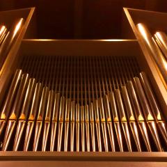 Close up of shimmering pipe organ